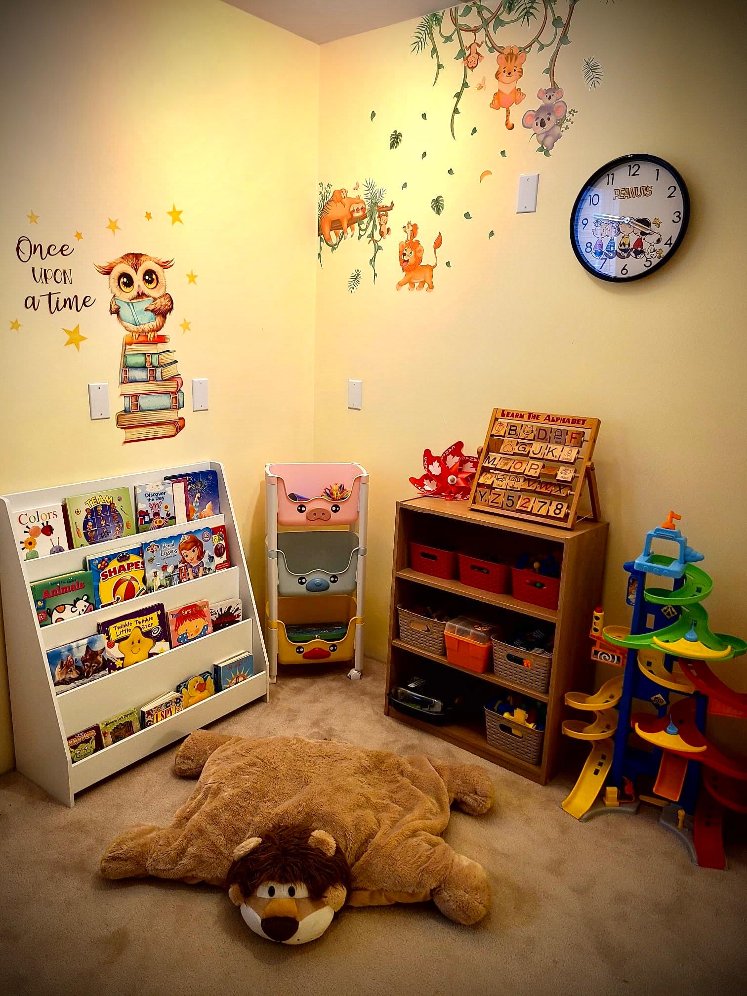 Children's books and reading shelf in the daycare reading area